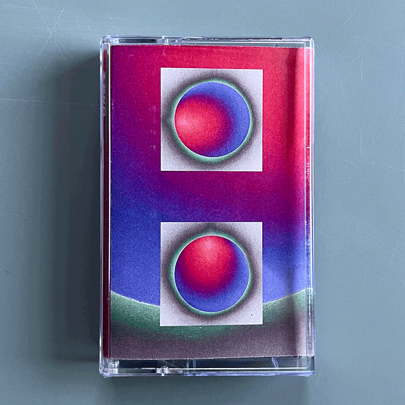 The cover of the Komorebi mixtape is an abstract image featuring three circles of light, brightly coloured and grainy in texture