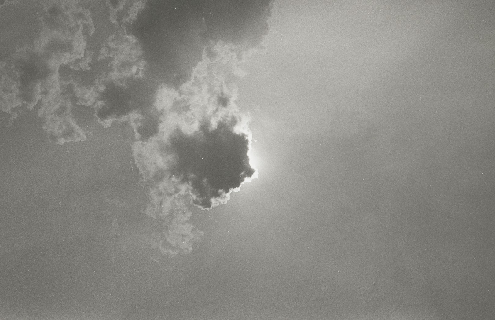 Black and white photo of some clouds in the sky